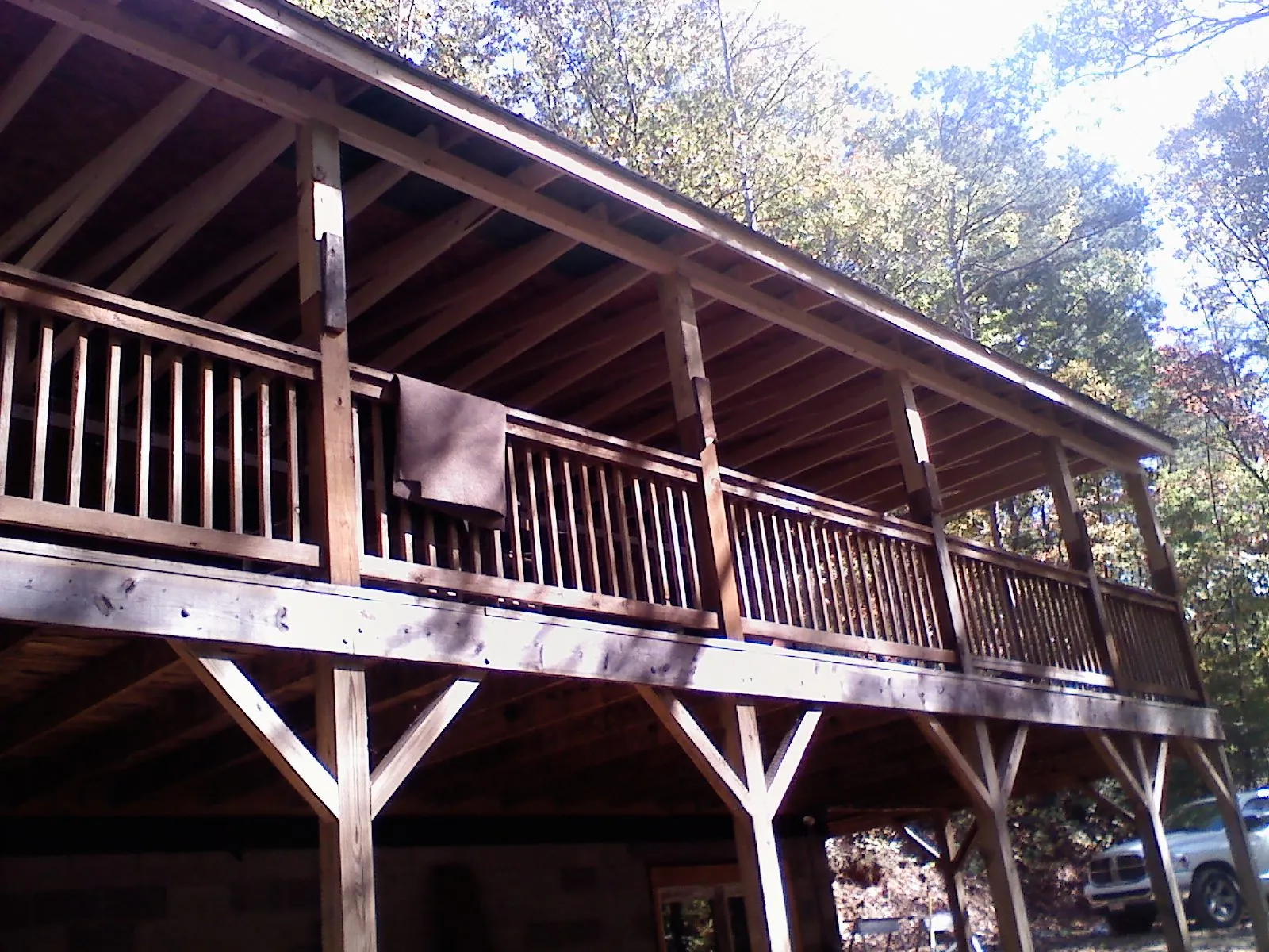 Timber framing under a new elevated porch and deck — Roof Leak Repair in North Attleboro by Roofing Brothers
